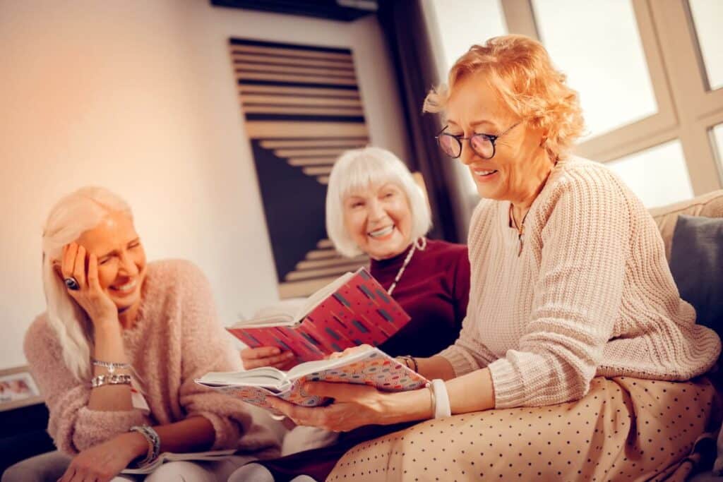 Baxter Senior Living | Senior Woman Holding A Book